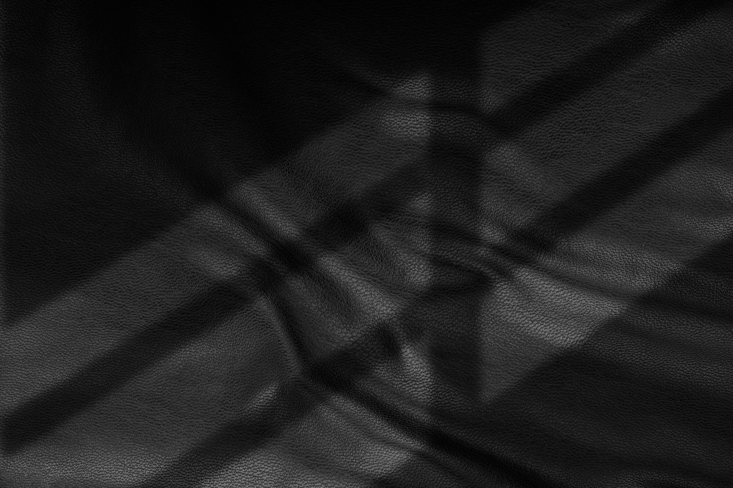 manunique_Uber-uns_Leder_Parallax_2400px